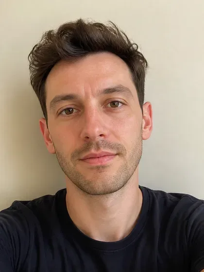 Clear selfie-style portrait of a man